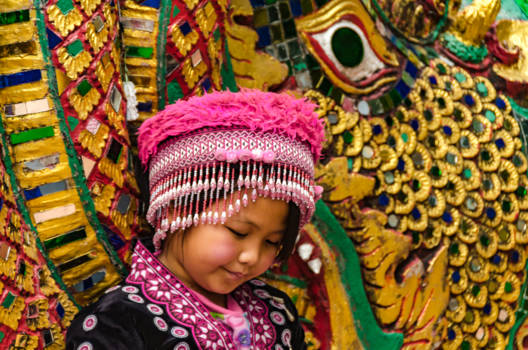 Wat Phrathat Doi Suthep - Shy girl posing at Naga