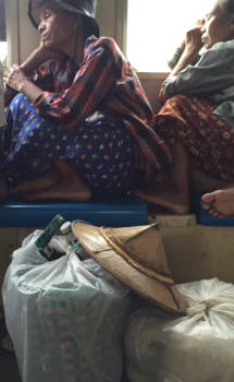 Myanmar - People you see in the train in Yangon, Myanmar.