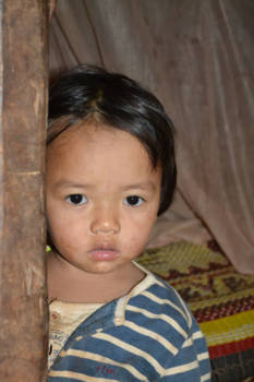 Chiang Mai - kind gemaakt bij een Akha stam