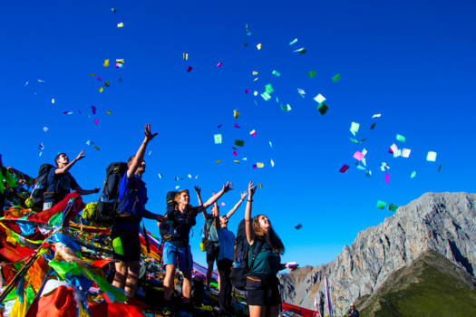 China - Celebrating reaching the 4200 m top in Jiuzhaigou National Park, Sichuan, China