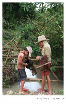 Laos - Laos sisters fishing