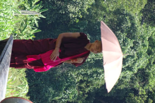 Inle Lake - Monk in the shade of his umbrella