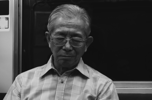 Tokio - Sleeping old Japanese man in Tokio subway
