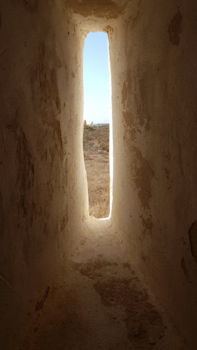 Maleisië - Uitzicht door een muur