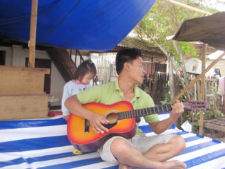 Laos - Playing gitar :)